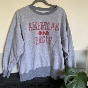 women's American Eagle distressed crew neck size L